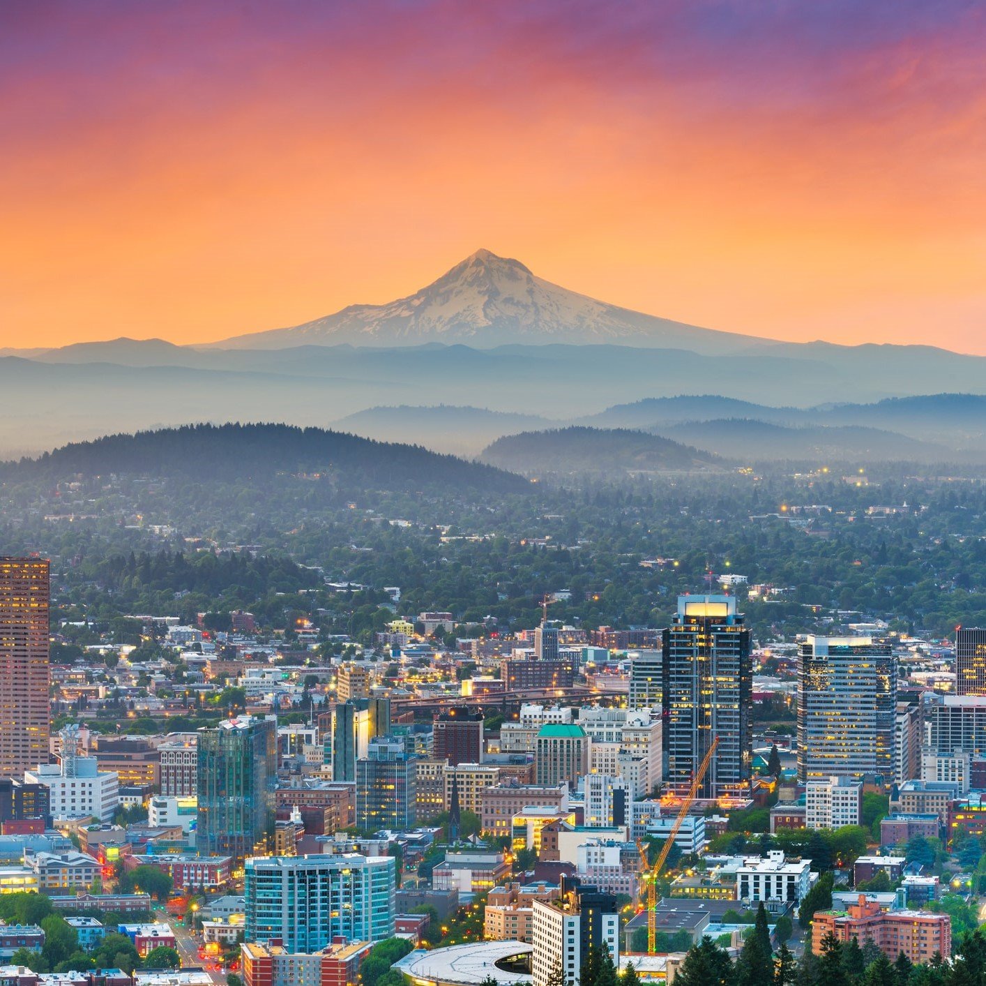 Portland, Oregon skyline with mountains in the background.