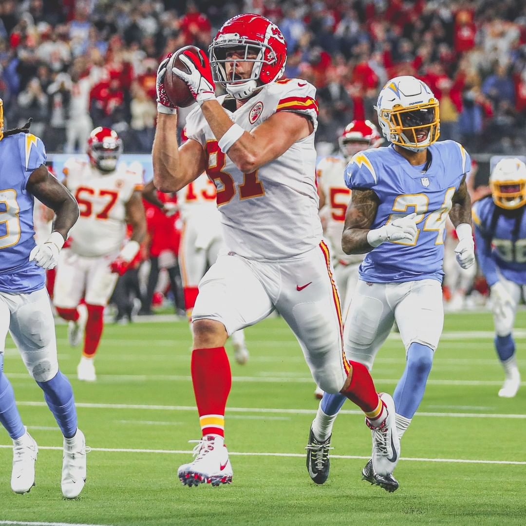 A member of the Kansas City Chiefs catching the football during a game.